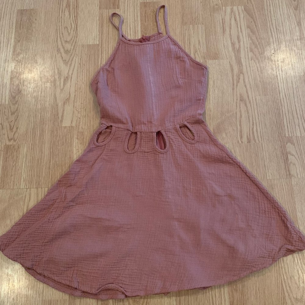 burnt orange dress with cut outs in the waist
